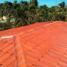 Miami-Roof-Seal-Coating-Red-Clay-Tile-Cleaning-Big-Green-Men 1